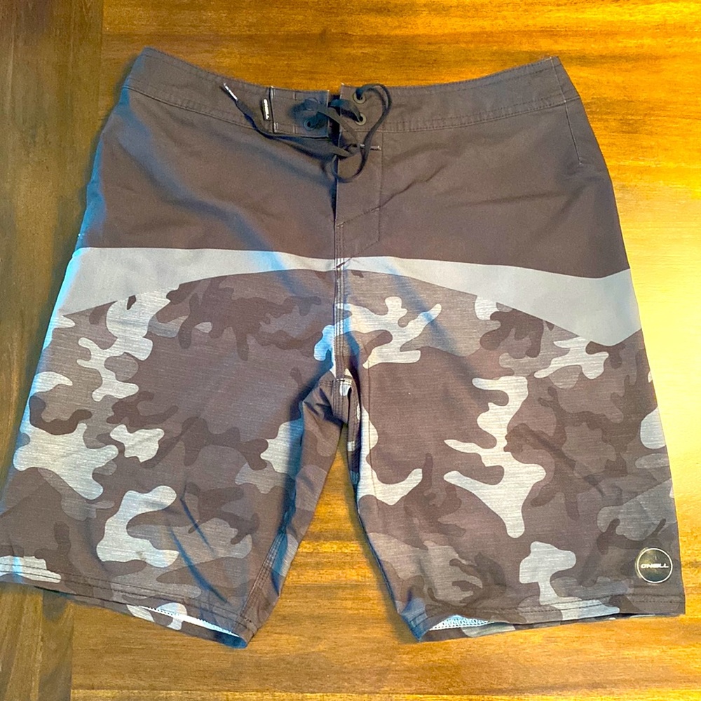 Excellent condition, Swim trunks, O’Neil, size 30, lace tie, back zipper pocket